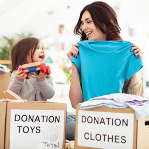 Mom and child donation clothes