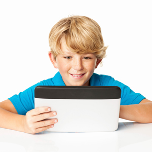 Boy playing on a tablet