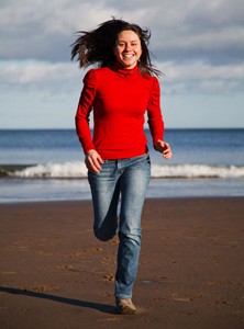 Woman running on the beach